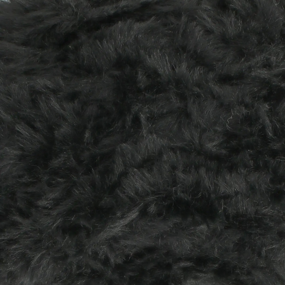 A skein of King Cole Velveteen polyester yarn in Dreamy Dust grey colour.