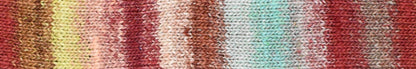 Knitted fabric swatch with a gradient of teal, yellow, brown, red colors.