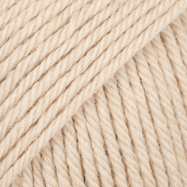 Close-up of beige wool and alpaca yarn from Drops