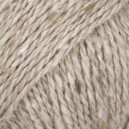 Close-up of beige wool/alpaca/viscose yarn from Drops