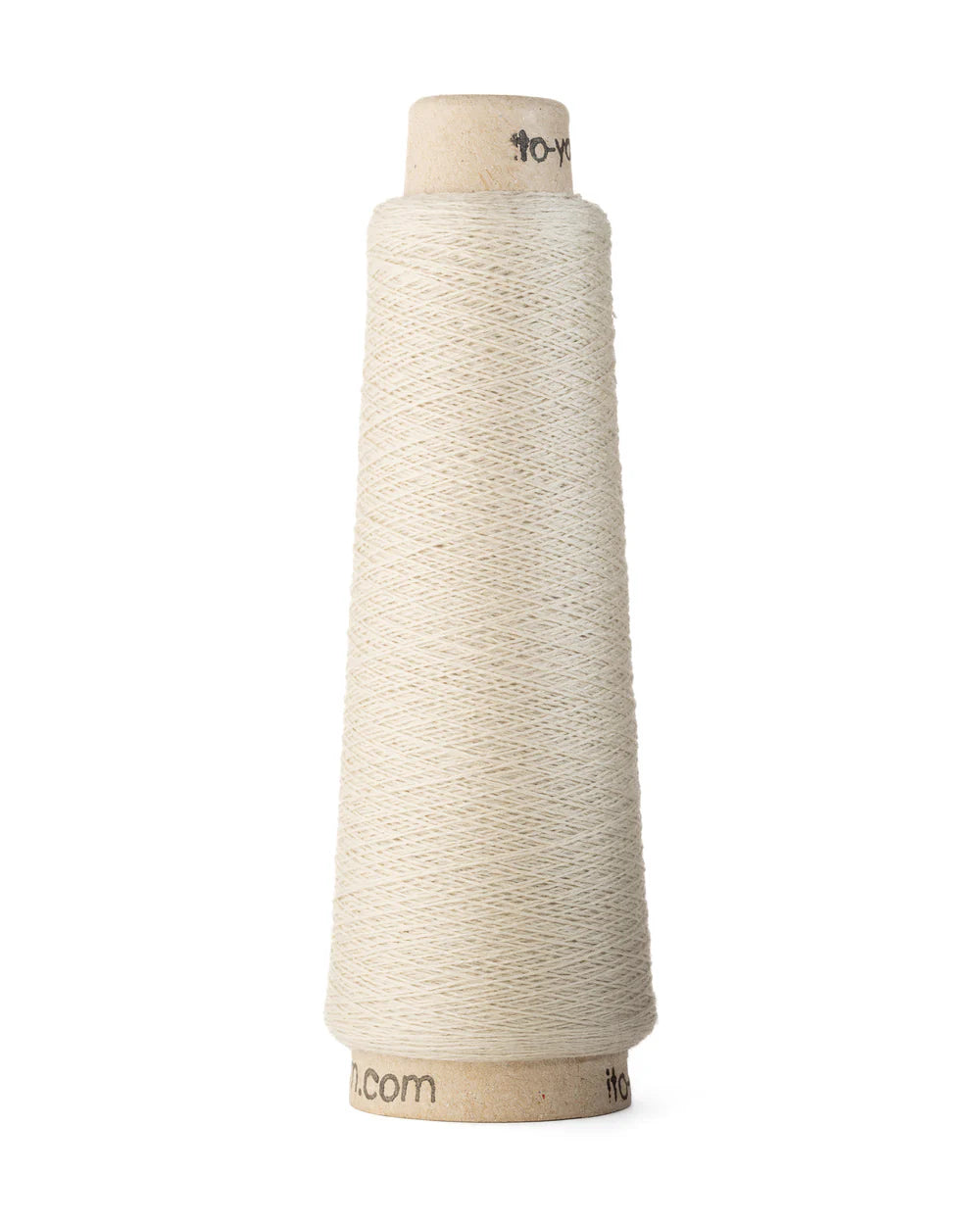 A spool of angora white merino wool fingering weight yarn.