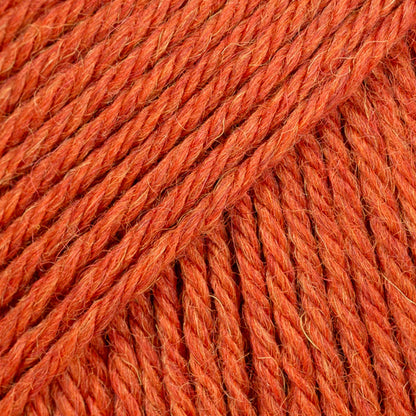 Close-up of orange-red wool and alpaca yarn from Drops