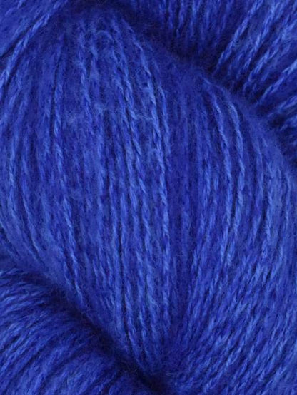 Close-up image of a skein of Condor blue colored cotton yarn.