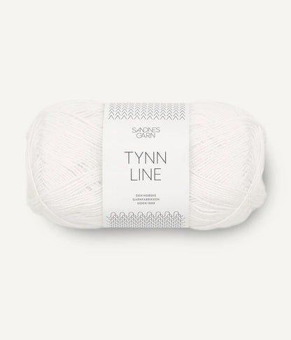 A ball of white cotton/linen/viscose yarn labeled 'TYNN LINE' by Sandnes Garn