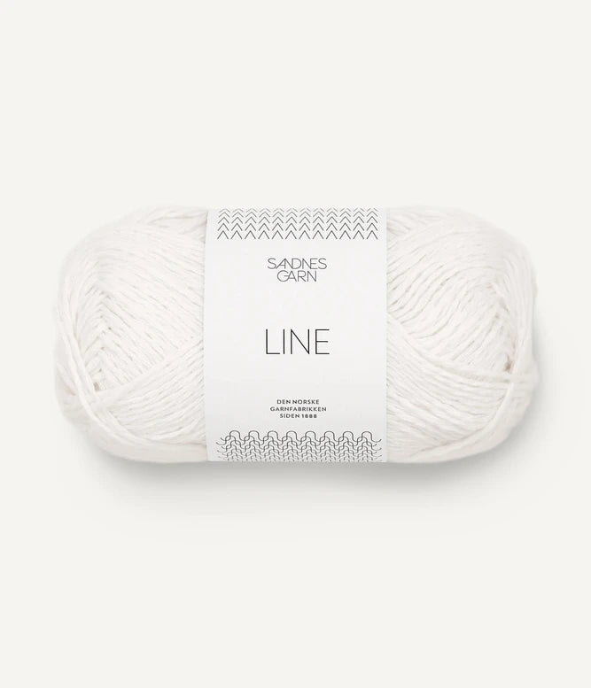 A ball of white coloured cotton/linen/viscose yarn labeled 'Line' by Sandnesgarn