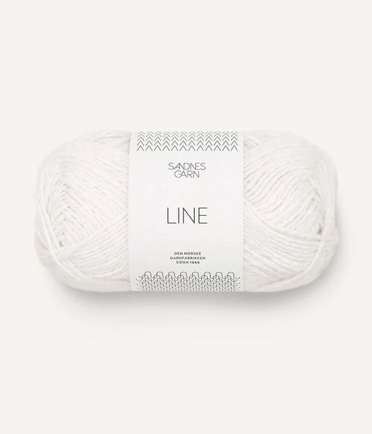 A ball of white coloured cotton/linen/viscose yarn labeled 'Line' by Sandnesgarn