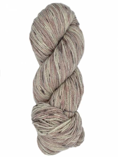 Skein of white, grey, and purple toned merino yarn