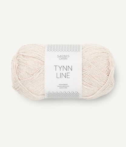 A ball of beige cotton/linen/viscose yarn labeled 'TYNN LINE' by Sandnes Garn