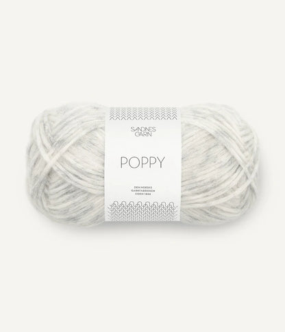 A ball of grey and white tonal alpaca, cotton, wool yarn labeled 'Poppy' by Sandnesgarn