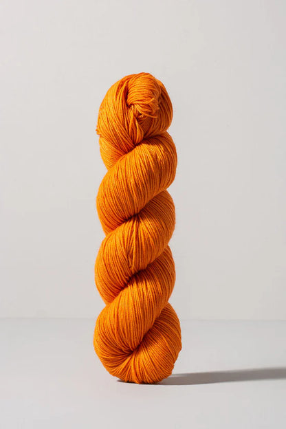 Light orange skein of merino and nylon yarn from Urth