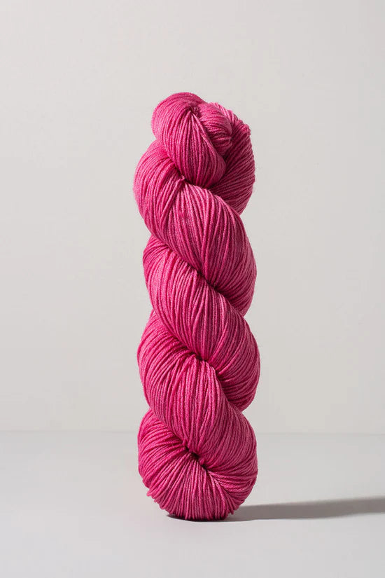 Bubblegum pink skein of merino and nylon yarn from Urth