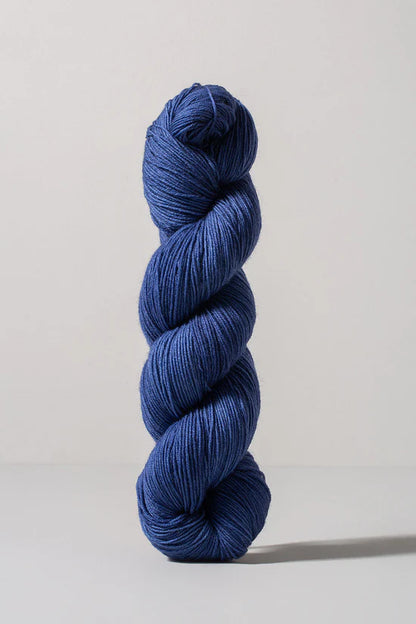 Blue skein of merino and nylon yarn from Urth