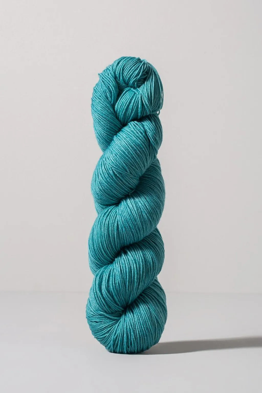 Aqua skein of merino and nylon yarn from Urth