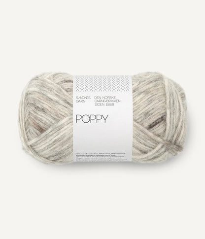 A ball of brown and grey tonal alpaca, cotton, wool yarn labeled 'Poppy' by Sandnesgarn