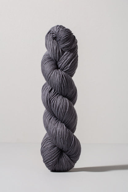 Grey skein of merino and nylon yarn from Urth