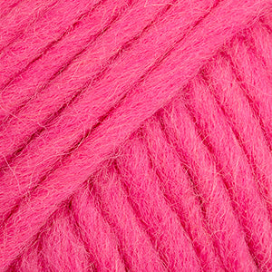 Close-up of a ball of bright pink-colored wool yarn from Drops