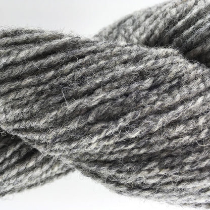 Close-up of a skein of light grey coloured wool yarn