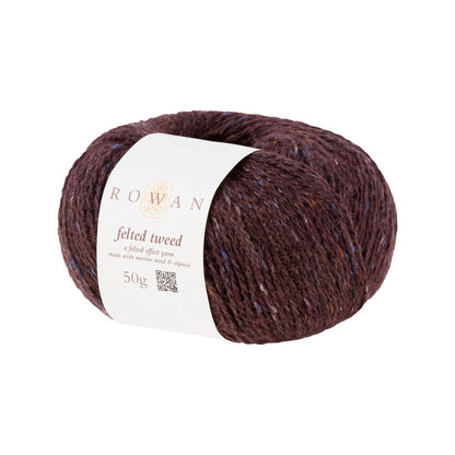 Ball of red-brown tweed yarn with a Rowan label 