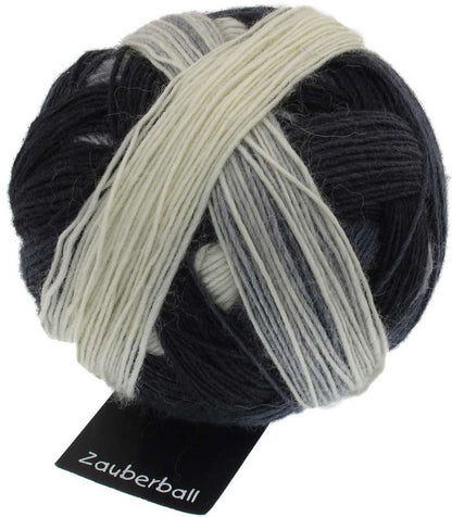 Ball of wool and nylon yarn in black and white colours