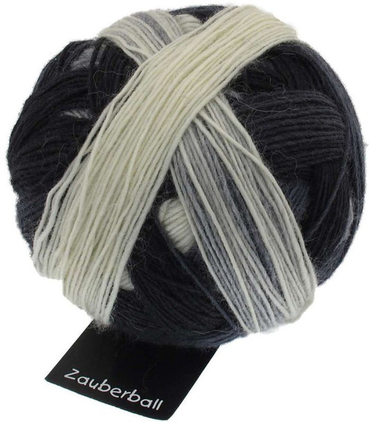 Ball of wool and nylon yarn in black and white colours