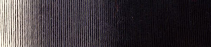 Up close image of white and black gradient yarn