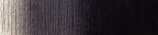 Up close image of white and black gradient yarn