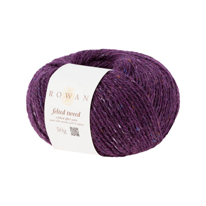Ball of plum tweed yarn with a Rowan label 