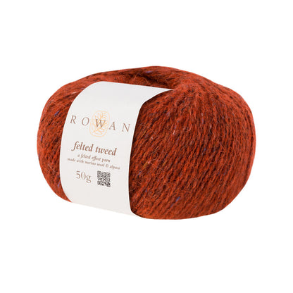 Ball of orange tweed yarn with a Rowan label 