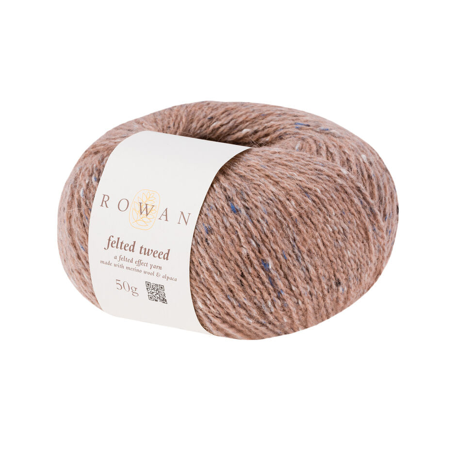 Ball of beige tweed yarn with a Rowan label 