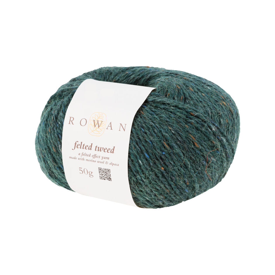 Ball of green tweed yarn with a Rowan label 