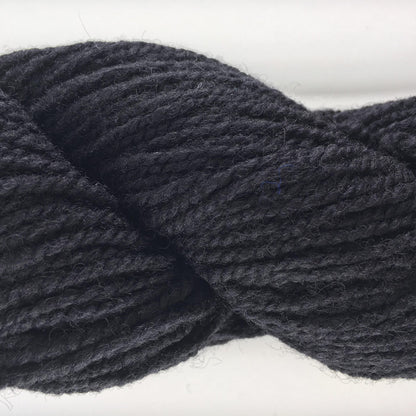 Close-up of a skein of black coloured wool yarn