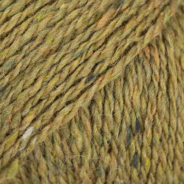 Close-up of yellow-green wool/alpaca/viscose yarn from Drops