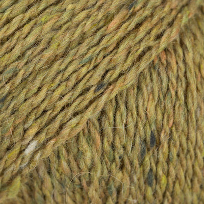 Close-up of yellow-green wool/alpaca/viscose yarn from Drops