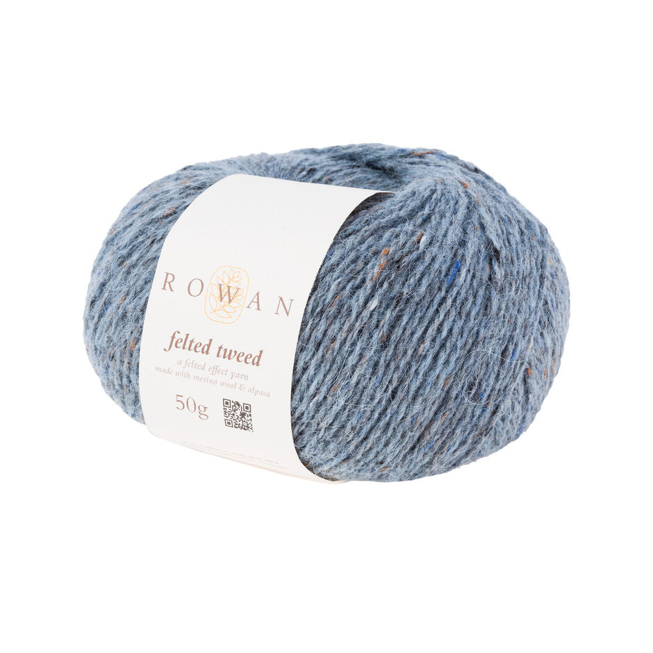 Ball of pale blue tweed yarn with a Rowan label 