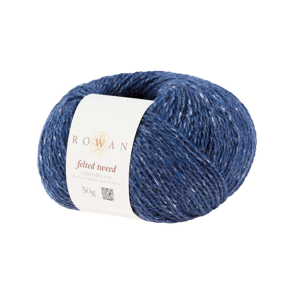 Ball of dark blue tweed yarn with a Rowan label 
