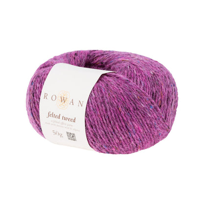 Ball of hot pink tweed yarn with a Rowan label 