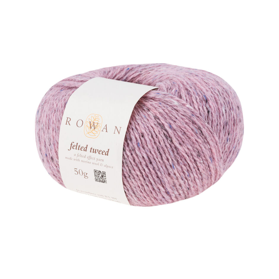 Ball of pale pink tweed yarn with a Rowan label 