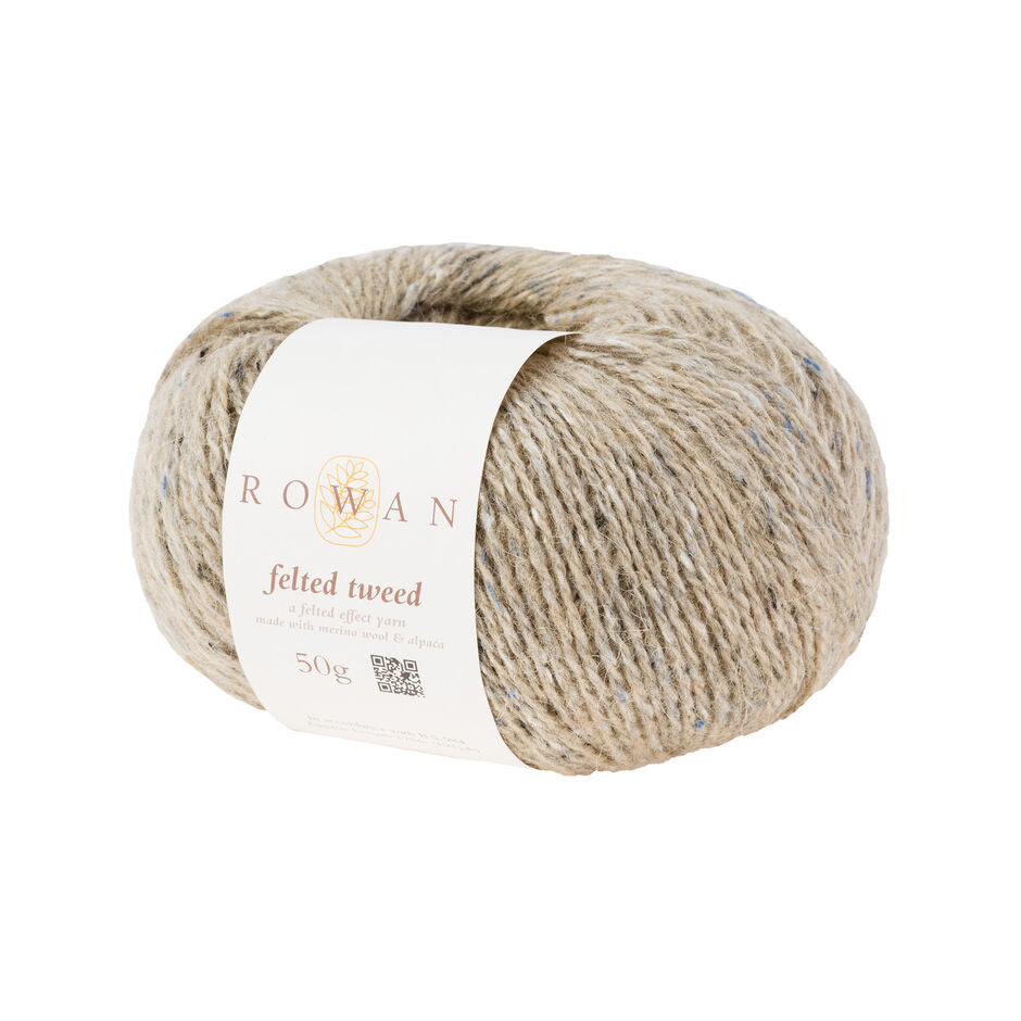 Ball of light beige tweed yarn with a Rowan label 