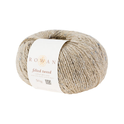 Ball of light beige tweed yarn with a Rowan label 