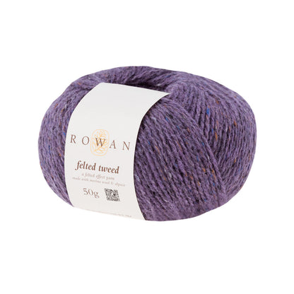 Ball of amethyst tweed yarn with a Rowan label 