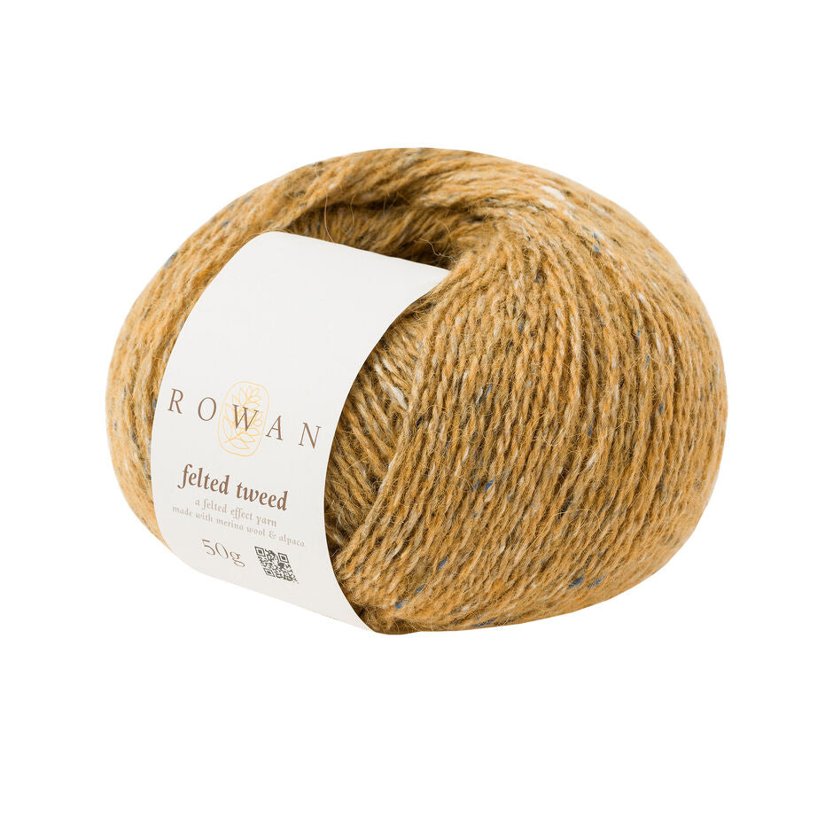 Ball of mustard tweed yarn with a Rowan label 