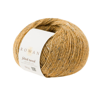 Ball of mustard tweed yarn with a Rowan label 