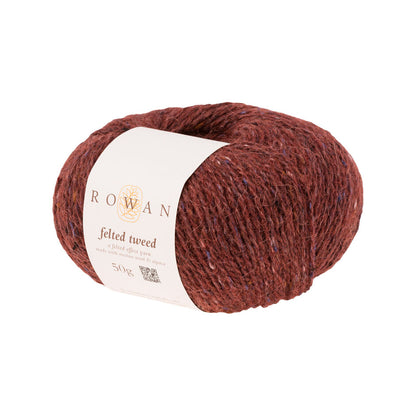 Ball of red-brown tweed yarn with a Rowan label 