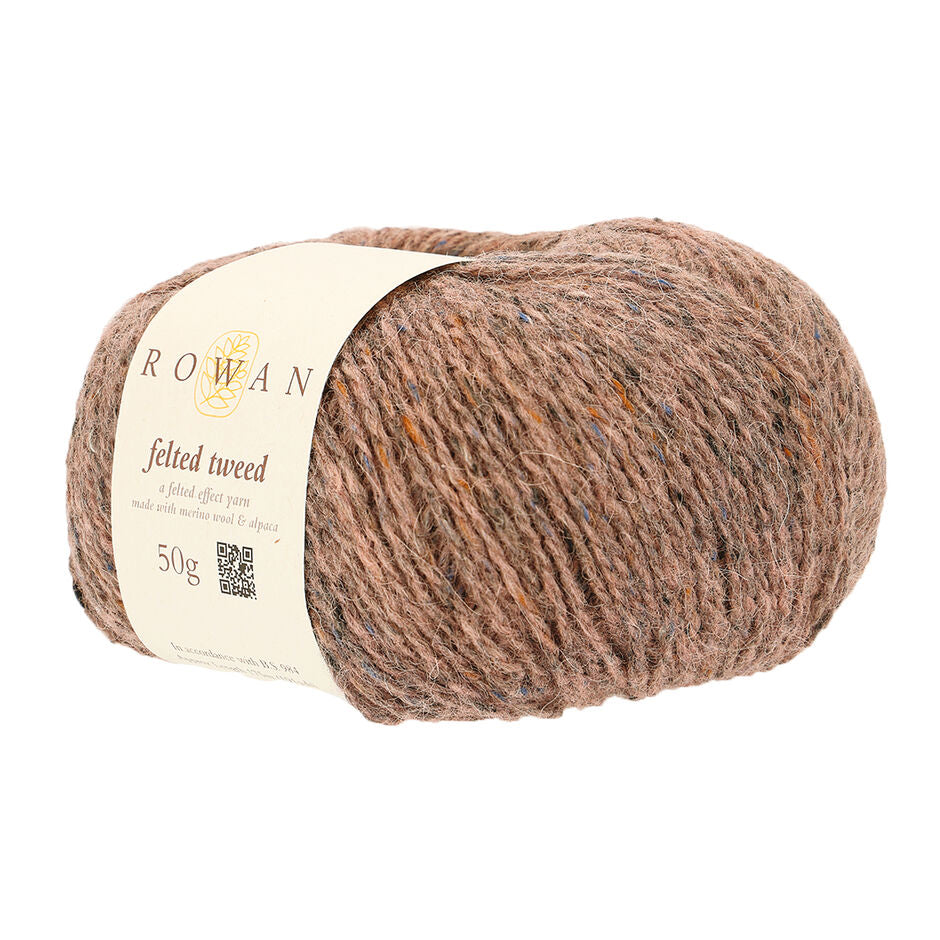 Ball of beige-pink tweed yarn with a Rowan label 