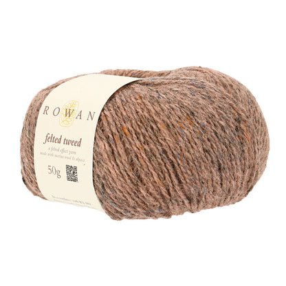 Ball of beige-pink tweed yarn with a Rowan label 