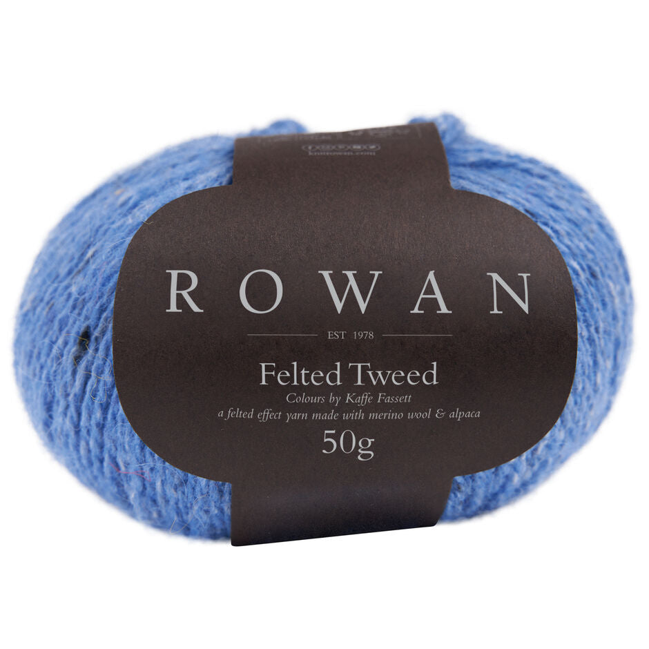 Ball of sky blue tweed yarn with a Rowan label 