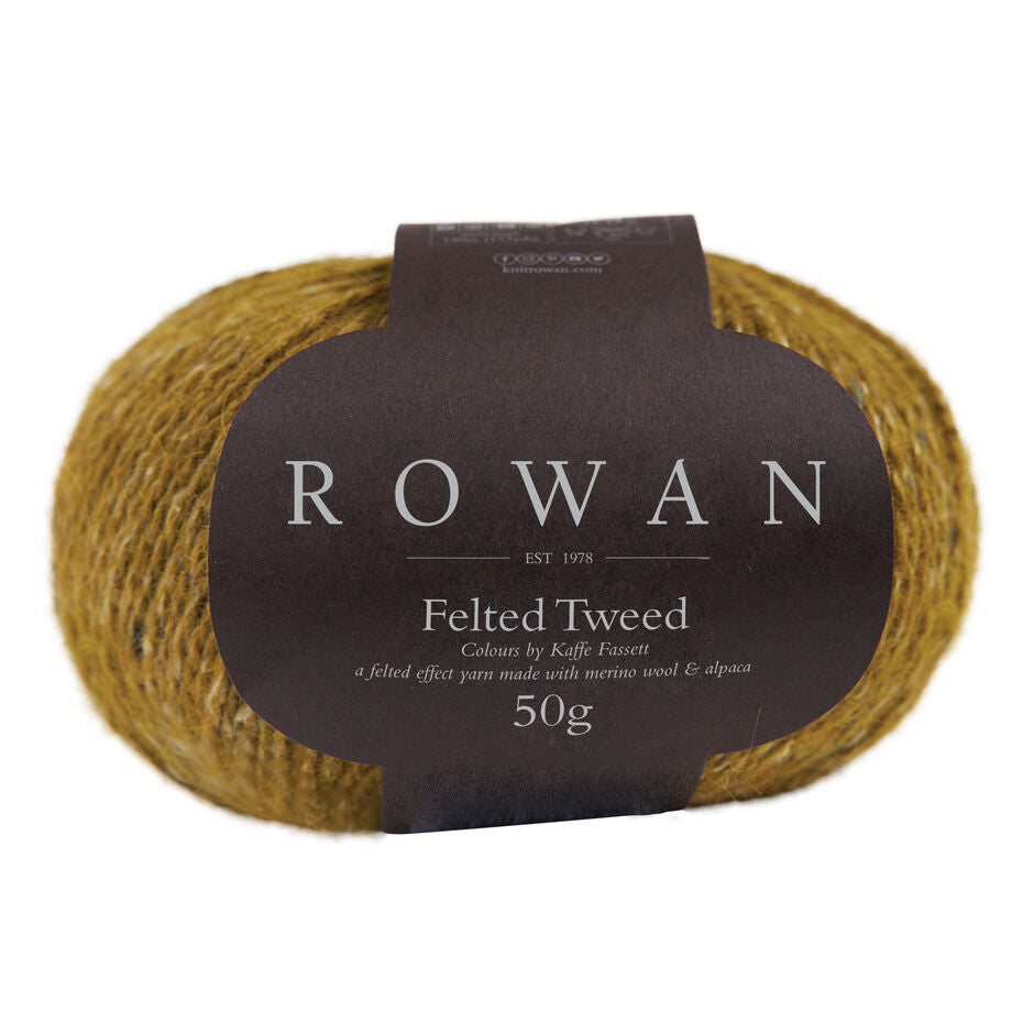 Ball of dark mustard tweed yarn with a Rowan label 