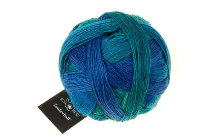 Ball of wool and nylon yarn in blue and teal tones