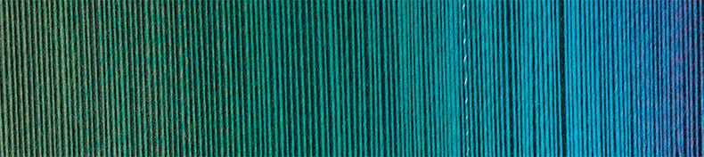 Up close image of teal and blue tonal yarn