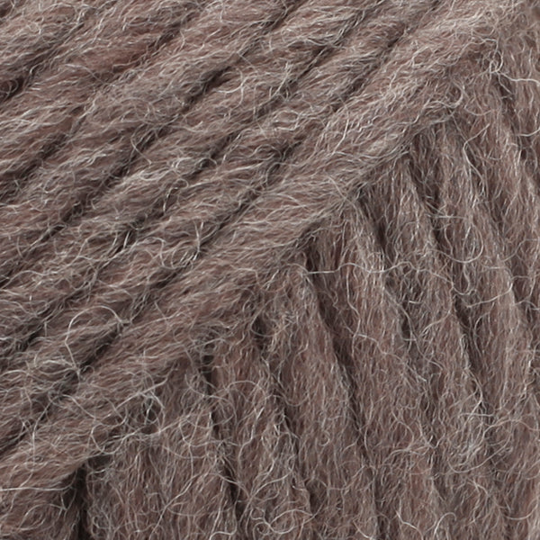 Close-up of a ball of brown-colored wool yarn from Drops